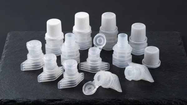key factors between choosing screw-on spout cap or flip-top spout cap
